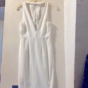 Very deep V neckline, detailed zipper design from back to front choker